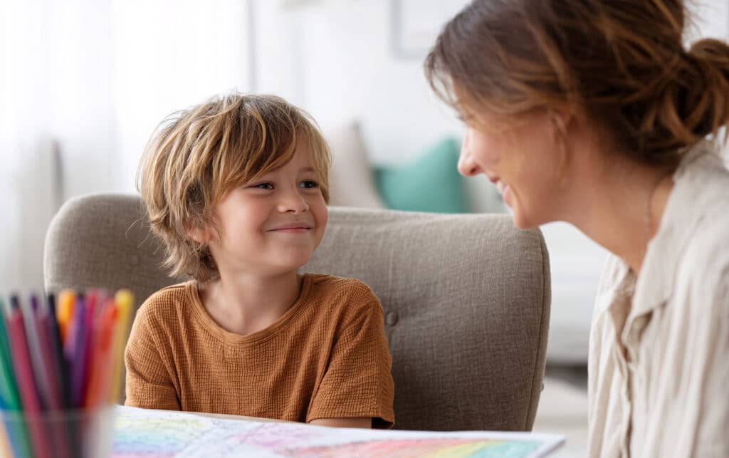 child and therapist looking at eachother